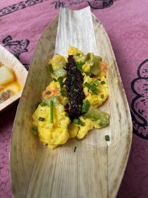 leaf bowl with scrambled eggs and chili crisp