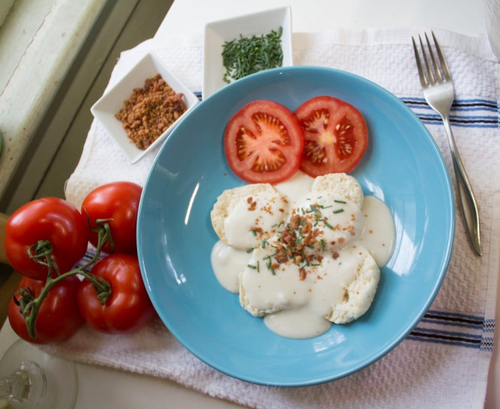 Biscuit and gravy with tomatoes