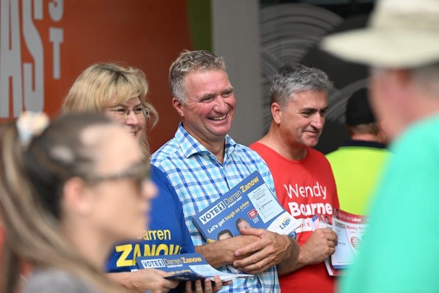 darren zanow with voters at a pre-polling booth