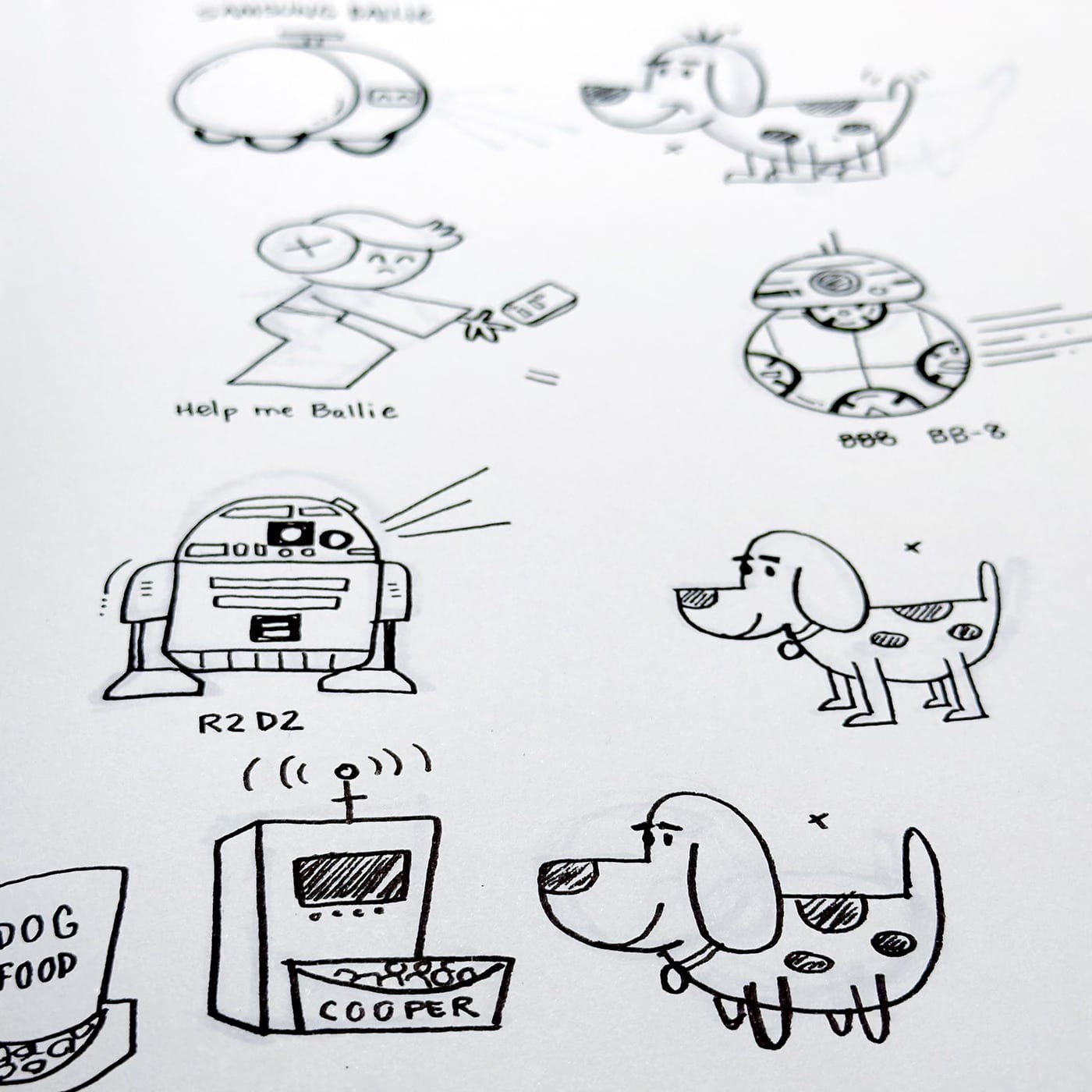 A sketchbook page with drawings of a cartoon dog and Star Wars characters.