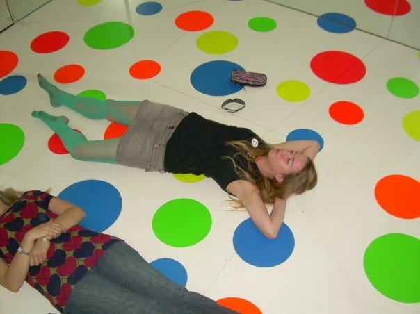 Kait and friends lay on the polka dot floor inside Kusama’s Infinity Dots Mirrored Room (1996) at the Mattress Factory in Pittsburgh c. 2008.