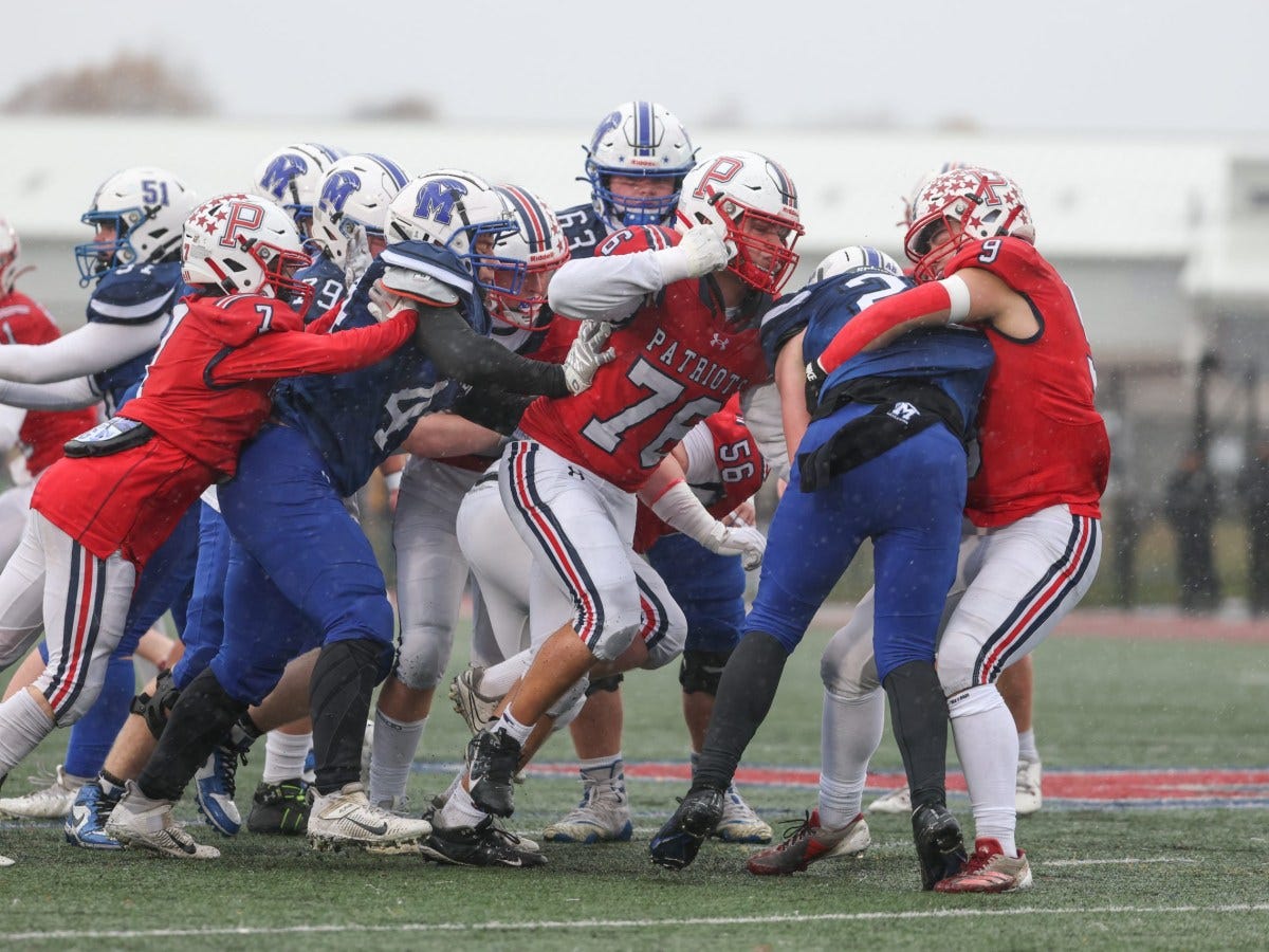 Portsmouth triumphs in Thanksgiving day football showdown