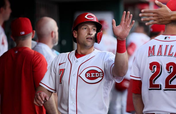 Spencer Steer of the Cincinnati Reds celebrates with teammates after scoring in the third inning against the Philadelphia Phillies at Great American...