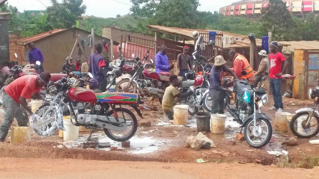 Wendi takes photos while in country that become reference for creating stories or other communication efforts. This is her photo of a boda boda (motorcycle) wash in Uganda. Wendi takes photos while in country that become reference for creating stories or other communication efforts. This is her photo of a boda boda (motorcycle) wash in Uganda.