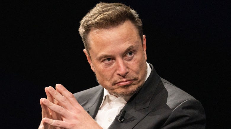 Elon Musk looking away