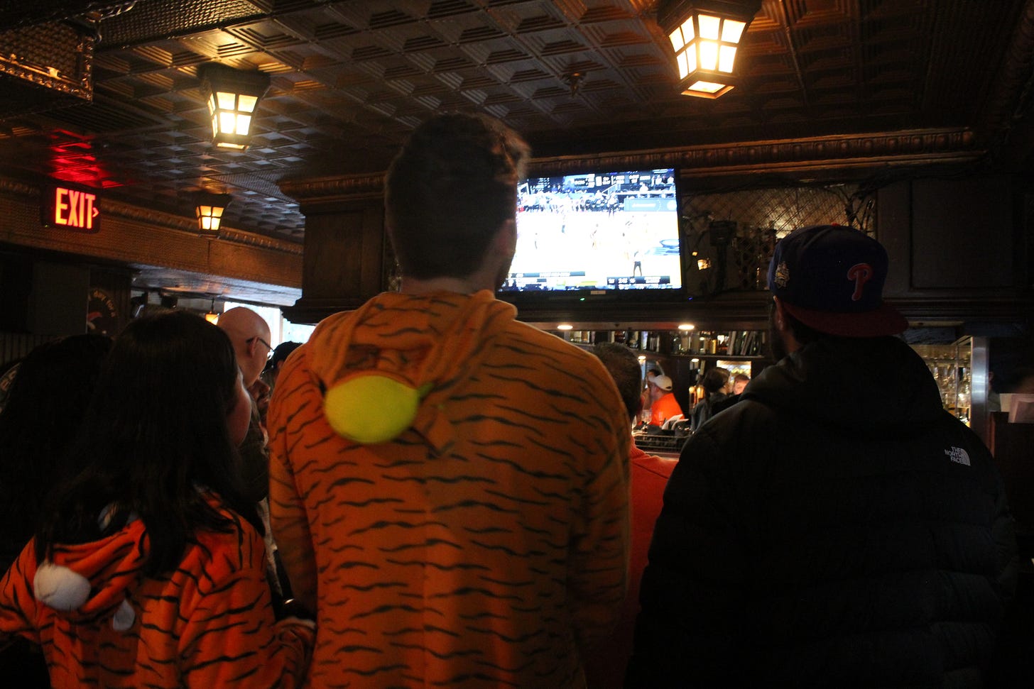 Princeton fans watch the second-round game against Missouri at Winberie’s on March 18, 2023. (Photo by Adam Zielonka)