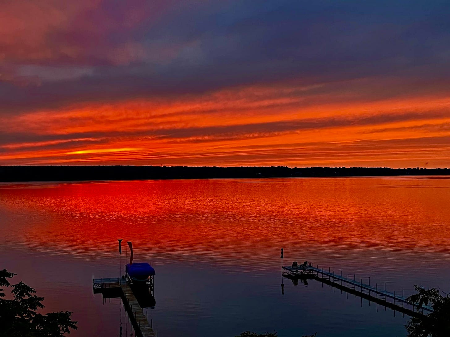 May be an image of horizon, body of water and twilight