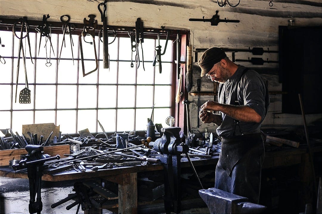 man inside tool shed
