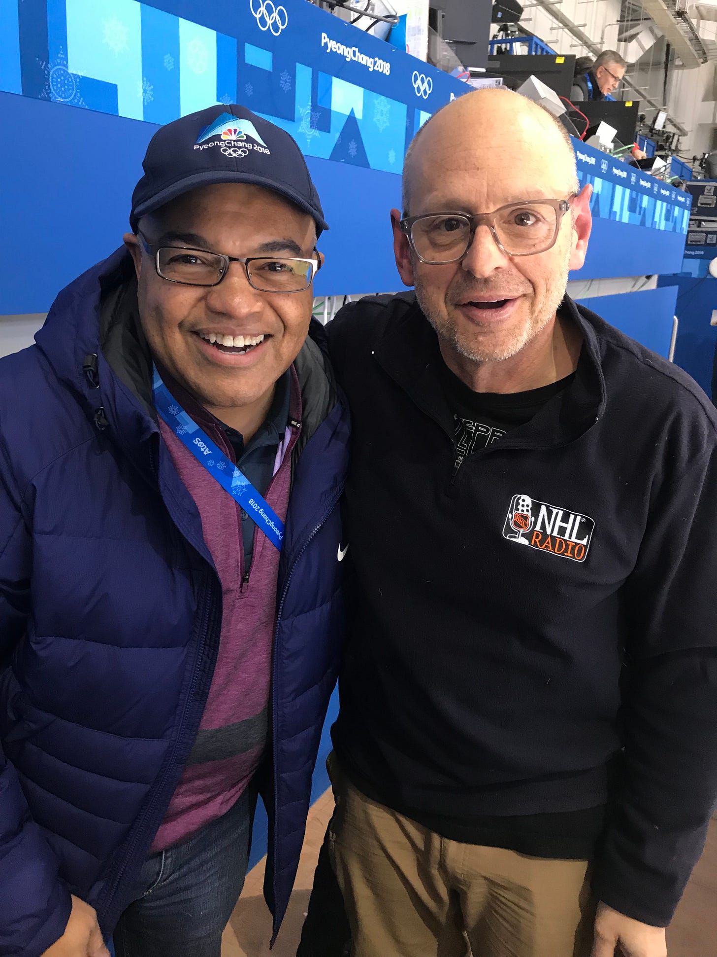 Photo of Ralph Strangis and Mike Tirico