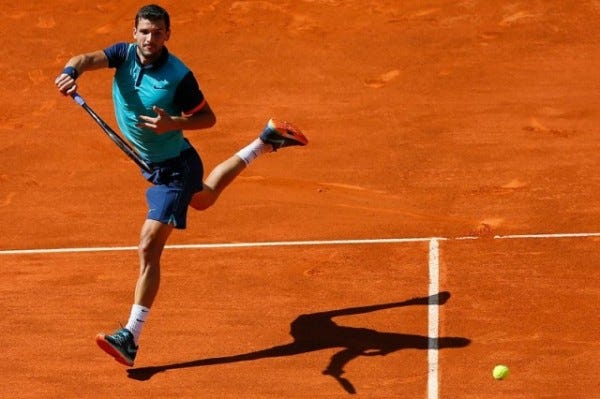 grigor dimitrov jumps for 2015 rome masters open win