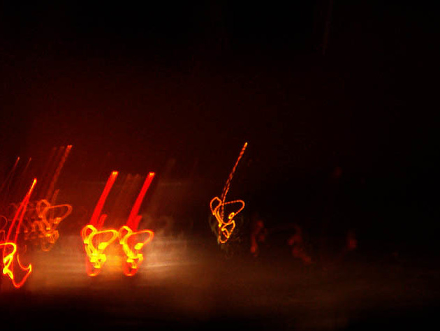 Photo I took when I was 14, a light play caused by long exposure and moving cars in the rain.