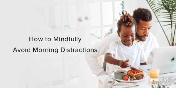 Black man with his son, sitting at a computer and eating breakfast. Text overlay: How to Mindfully Avoid Morning Distractions