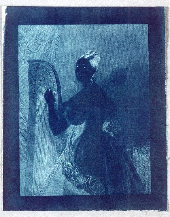 Cyanotype print by Sir John Herschel, of an unknown woman playing the harp (1842)