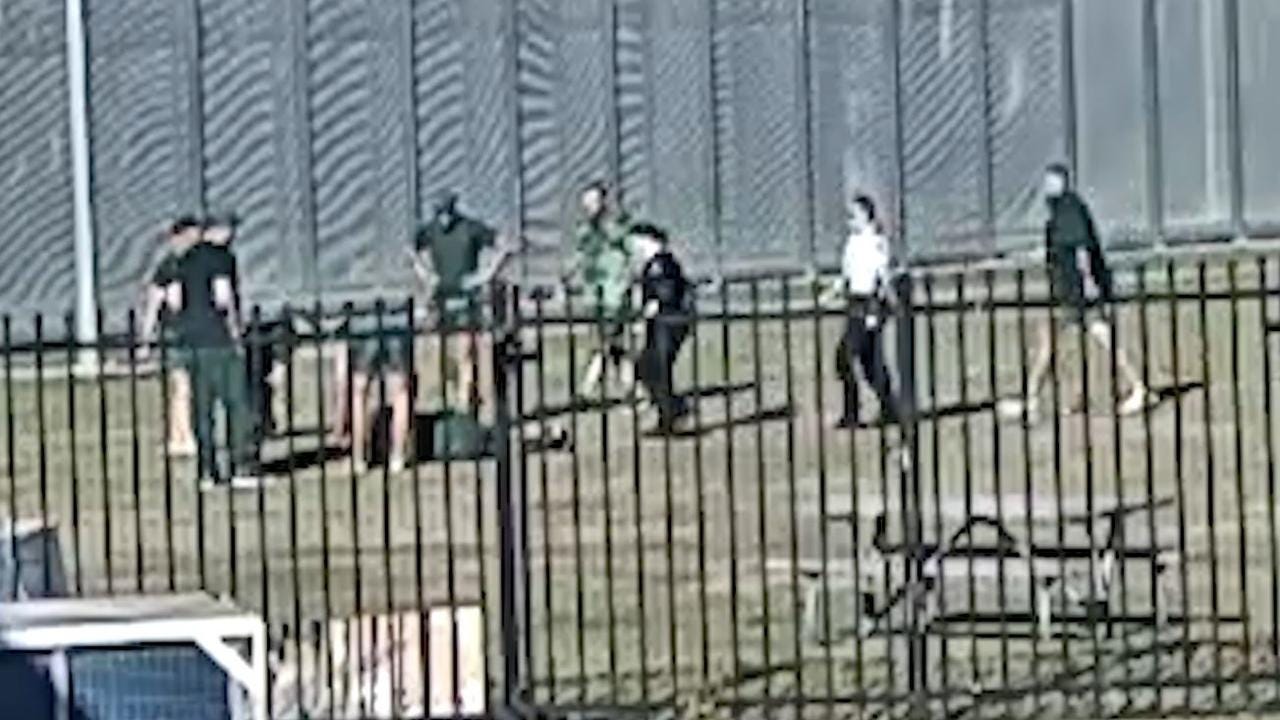 CCTV from Geoffrey Pearce Correctional Centre shows the man suddenly collapse during a game of touch footy.