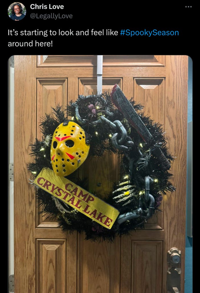 Social media post with wreath on a door with Jason mask that says Camp Crystal Lake