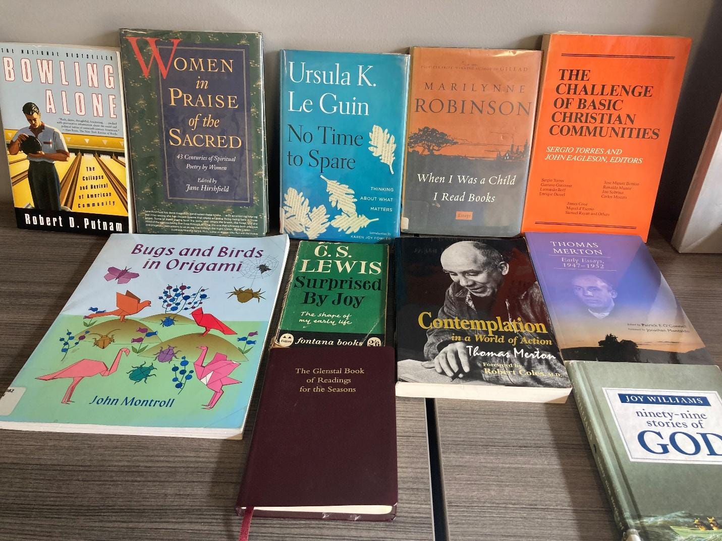 A group of books on a table

Description automatically generated