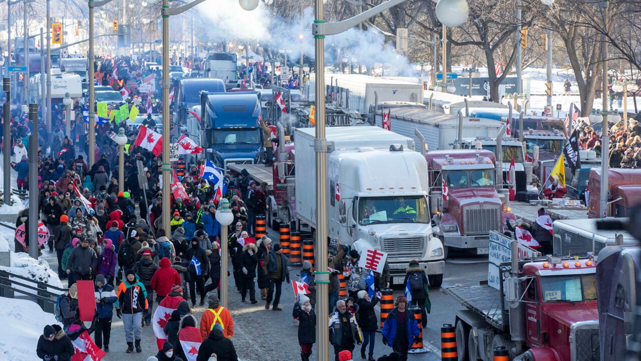 Canadian truckers cause chaos in second day of anti-vaccine protests