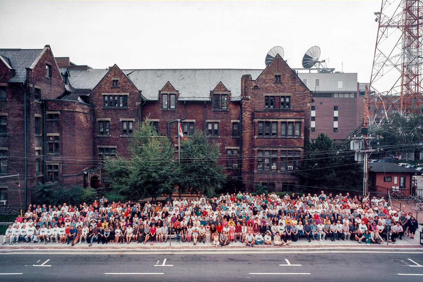 Photo of about 100 CBC staff before Jarvis Street Radio Building 