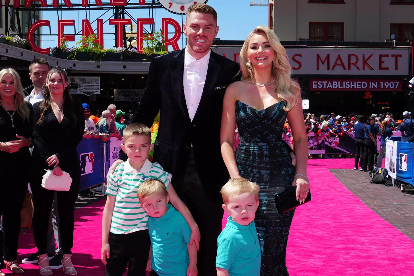 Freddie Freeman #5 of the Los Angeles Dodgers and family pose during the All-Star Red Carpet Show