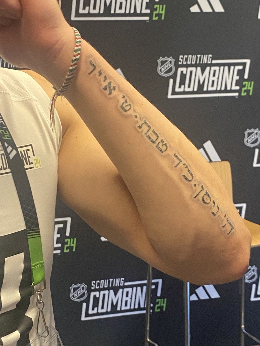 Adam Kimelman on X: "Zeev Buium showing off the tatoo on his left forearm.  It's the dates in Hebrew that he won gold at the World Under-18s, the World  Juniors and the