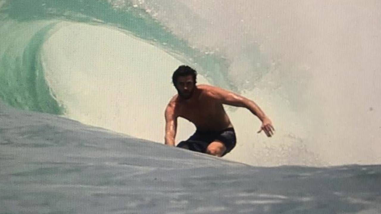 liam hemsworth surfing tight suit 2019