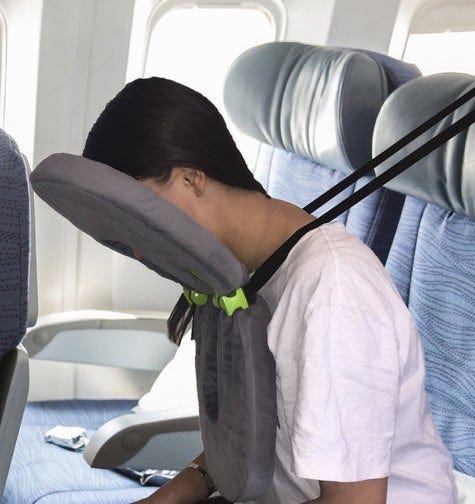 17 Helpful Things That'll Make Sleeping On A Plane Suck Less