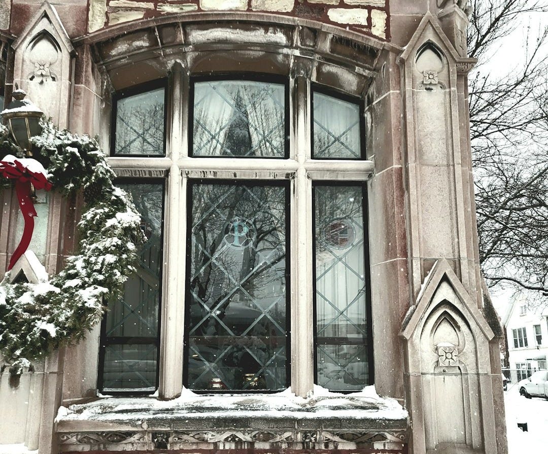 a building with a wreath on the front of it