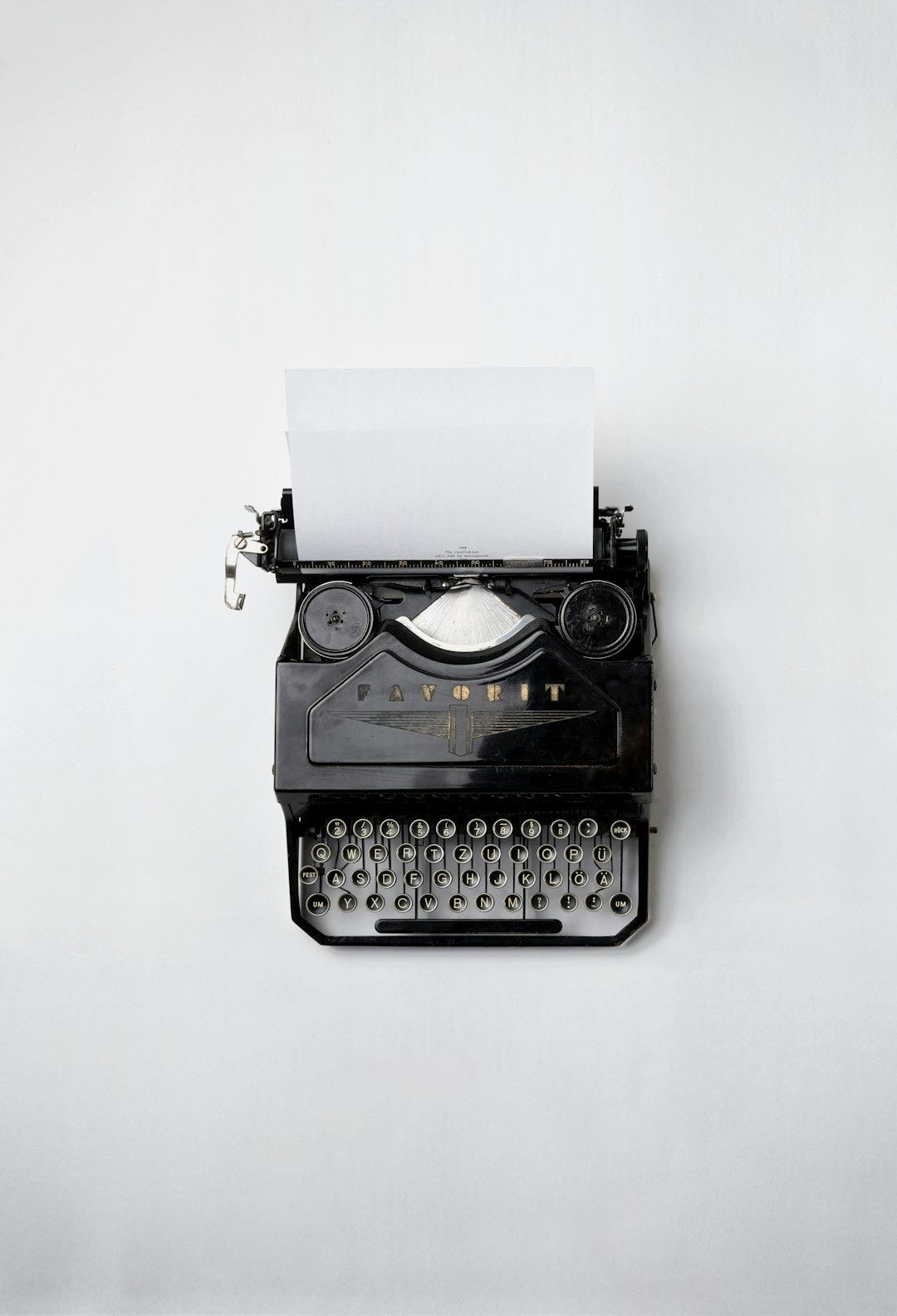 black Fayorit typewriter with printer paper black Fayorit typewriter with printer paper
