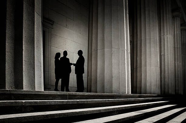 It's a Deal "Three people, silhouetted against a backdrop of

power, shaking hands.To see more of my financial images click on the

link below:" shady business stock pictures, royalty-free photos

& images