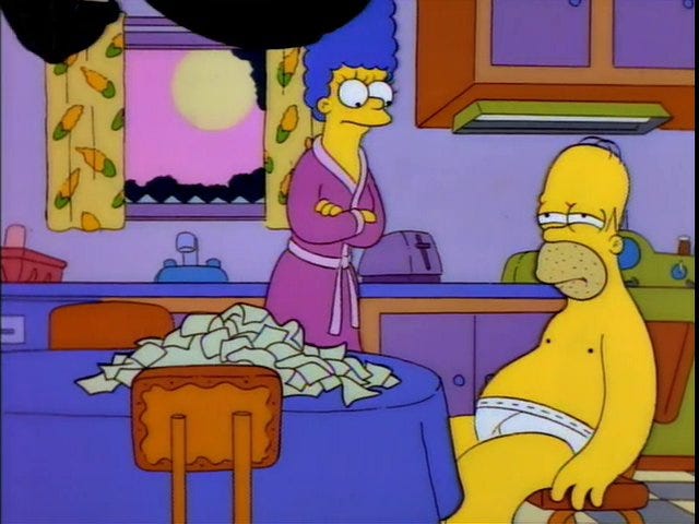A scene from The Simpsons, Marge happening upon the kitchen table with her arms crossed while wearing a purple robe. Homer sits there in his underwear. On the table are 64 wrappers from individually wrapped slices of American cheese