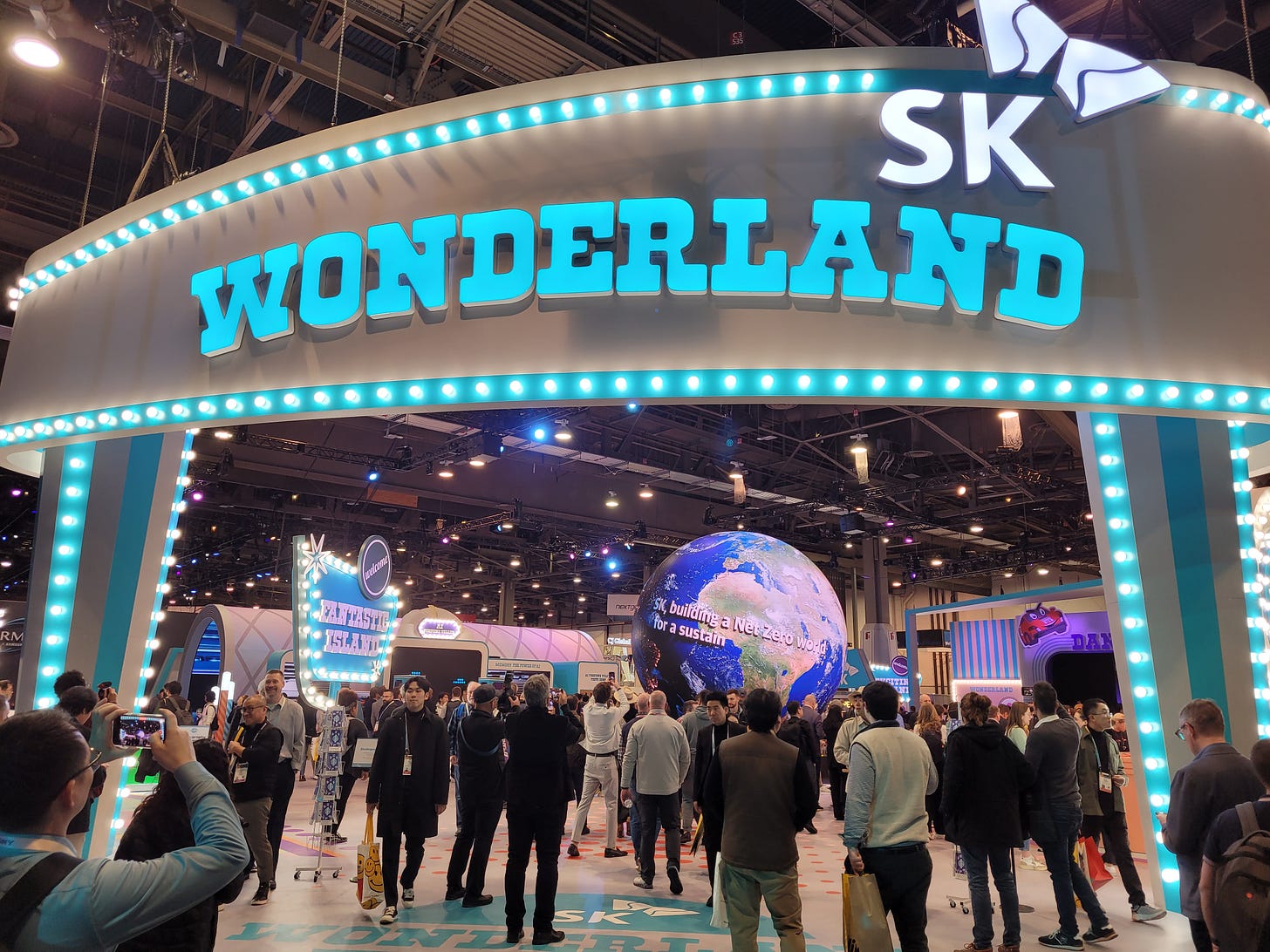 A stand at CES called "SK Wonderland", with crowds of people inside