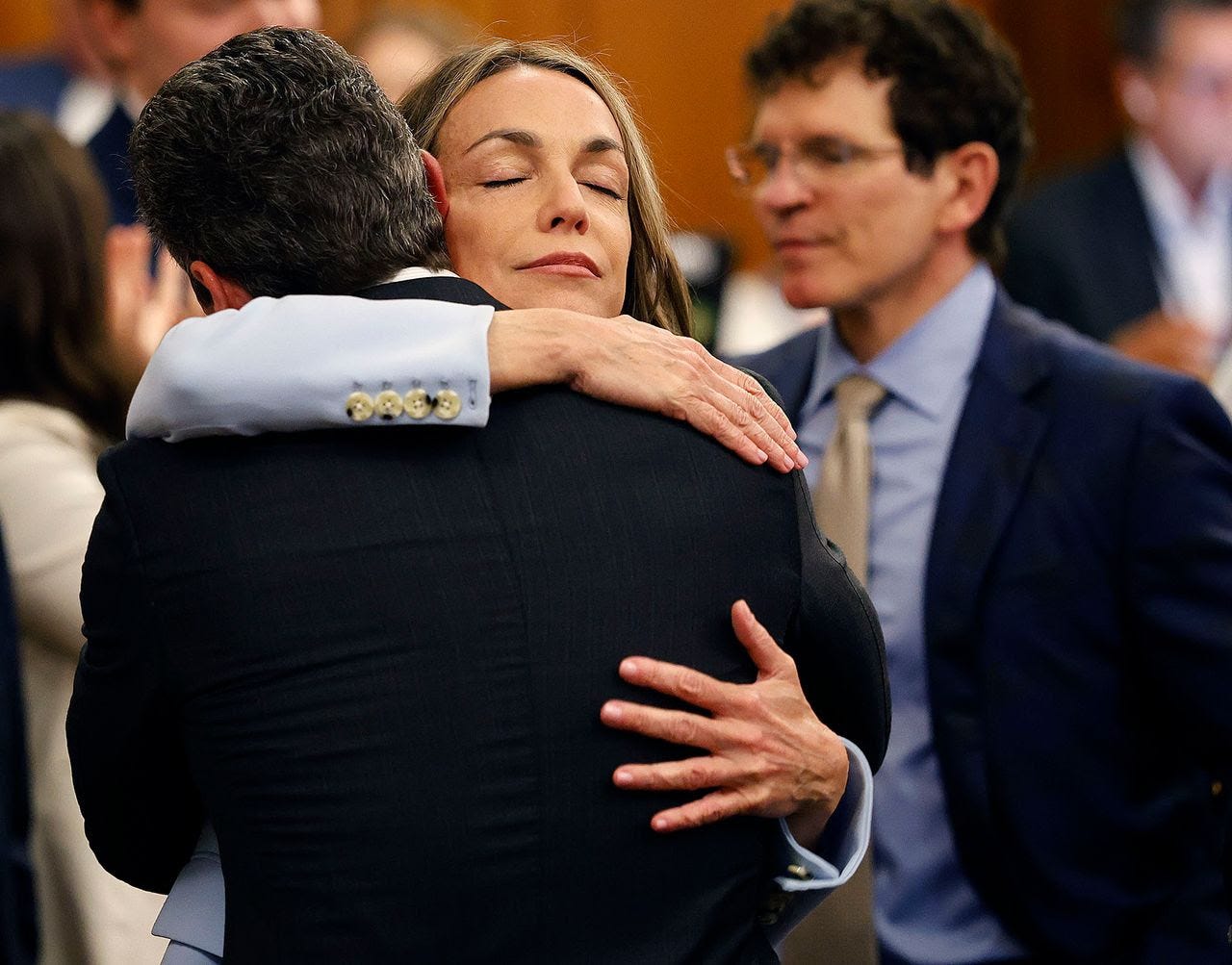 Karen Read hugs lawyer Alan Jackson after a not-guilty verdict of second-degree murder. (Greg Derr/Patriot Ledger/AP)