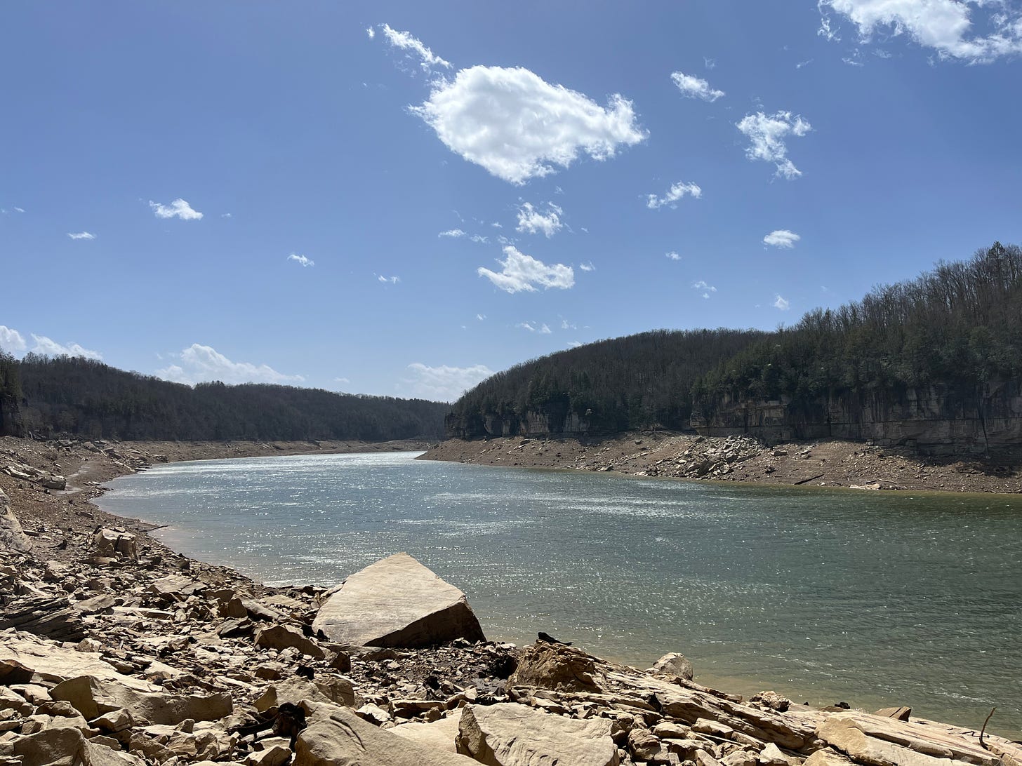 a picture of Summerville lake in West Virginia, with a sunny blue sky 