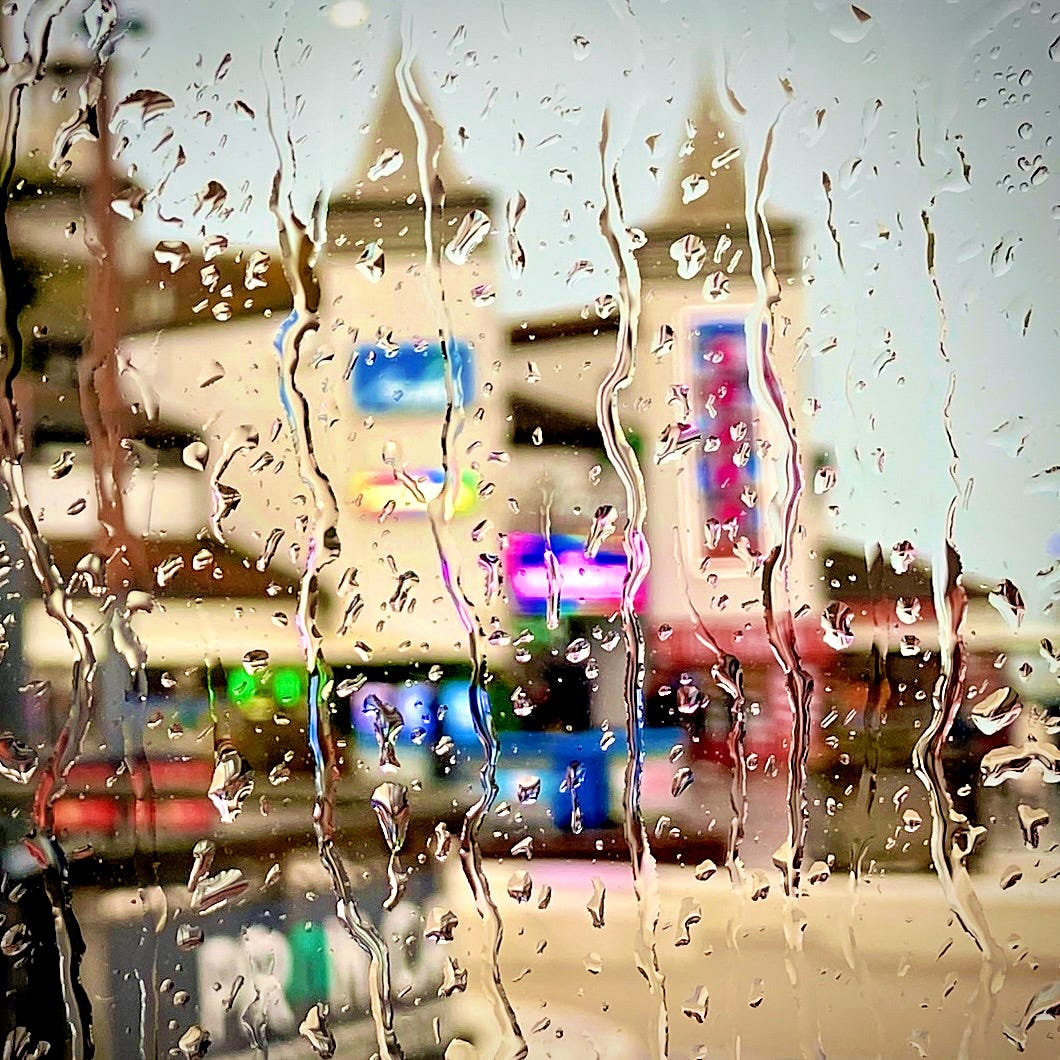 Rain forms rivulets on the window of the cafe, Bournemouth seafront during storm Noa, April 2023. © Jerome Whittingham
