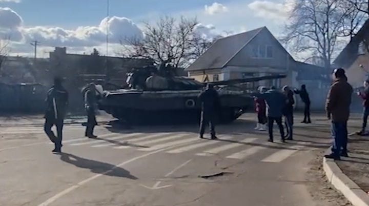 Moment man 'stops Russian tank with bare hands' as unarmed Ukrainians  confront soldiers - World News - Mirror Online
