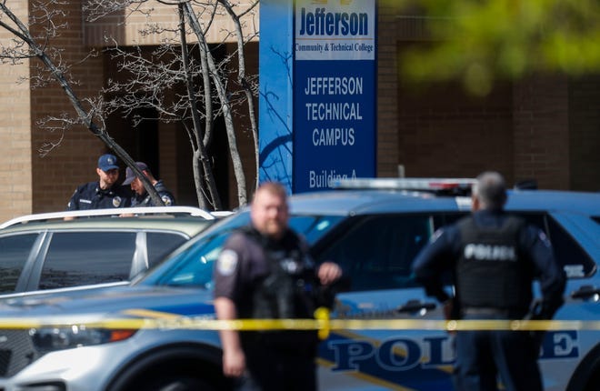 Two hours later after five people were shot and killed at the Old Louisville National bank in downtown, LMPD officers stand outside JCTC at 8th and Chestnut Streets Monday morning. LMPD tweeted that "there was a shooting outside and suspects fled prior to police arrival." April 9, 2023