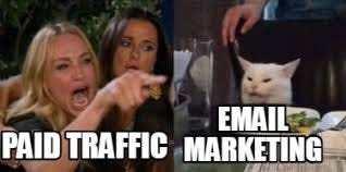 May be an image of 2 people and text that says 'EMAIL PAID TRAFFIC MARKETING'