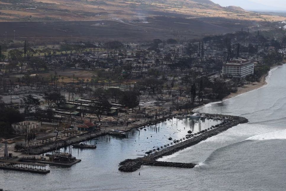 The tide comes in on the charred ruins of Lahaina, Hawaii.