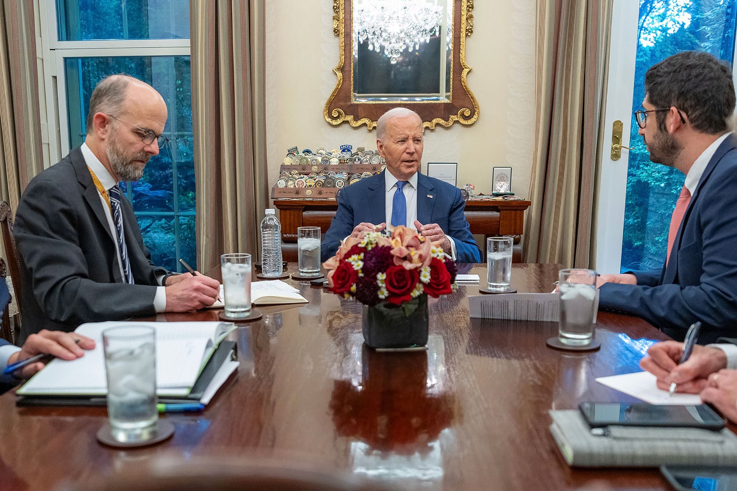 President Joe Biden participates in an interview with TIME's Washington bureau chief Massimo Calabresi, and Editor-in-Chief Sam Jacobs in the Oval Office Private Dining Room of the White House on May 28, 2024.