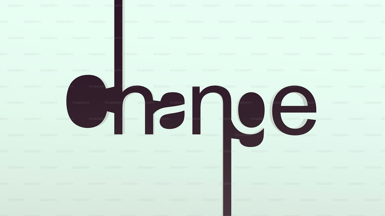 a black and white photo of the word change