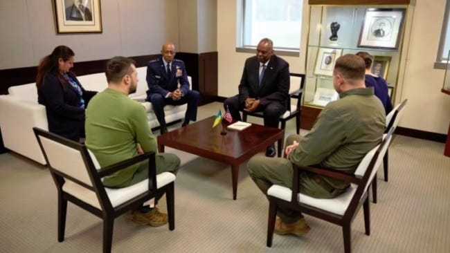 In a photo posted on his Telegram channel, Ukrainian President Volodymyr Zelenskyy meets with U.S. Defense Secretary Lloyd Austin and Chairman of the Joint Chiefs of Staff General Charles Brown, Dec. 11, 2023.