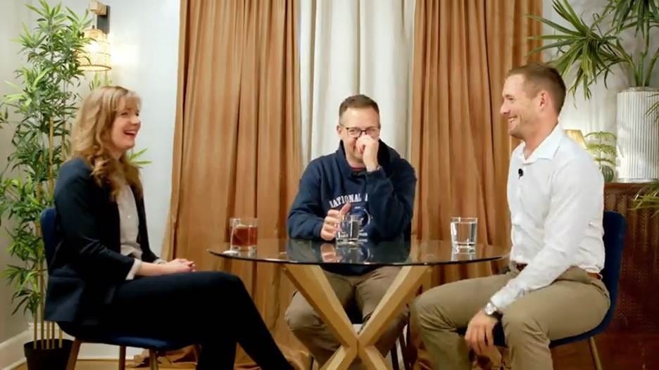 A group of people sitting at a table AI-generated content may be incorrect. A group of people sitting at a table AI-generated content may be incorrect.