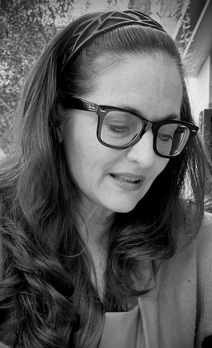 Black and white photo of the author, Melissa L. White .