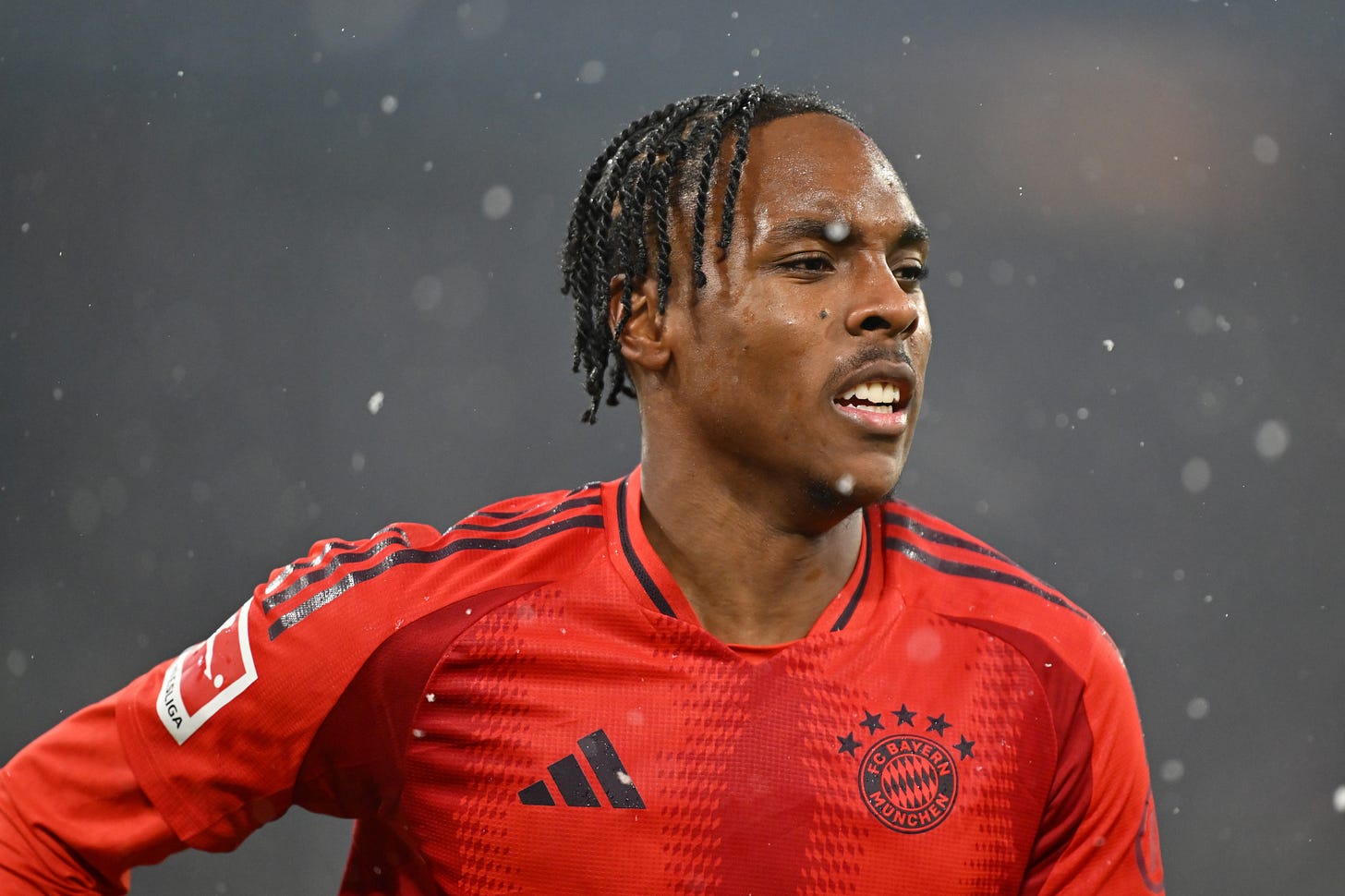 Mathys Tel looks on during the Bundesliga match between FC Bayern München and TSG 1899 Hoffenheim at Allianz Arena.