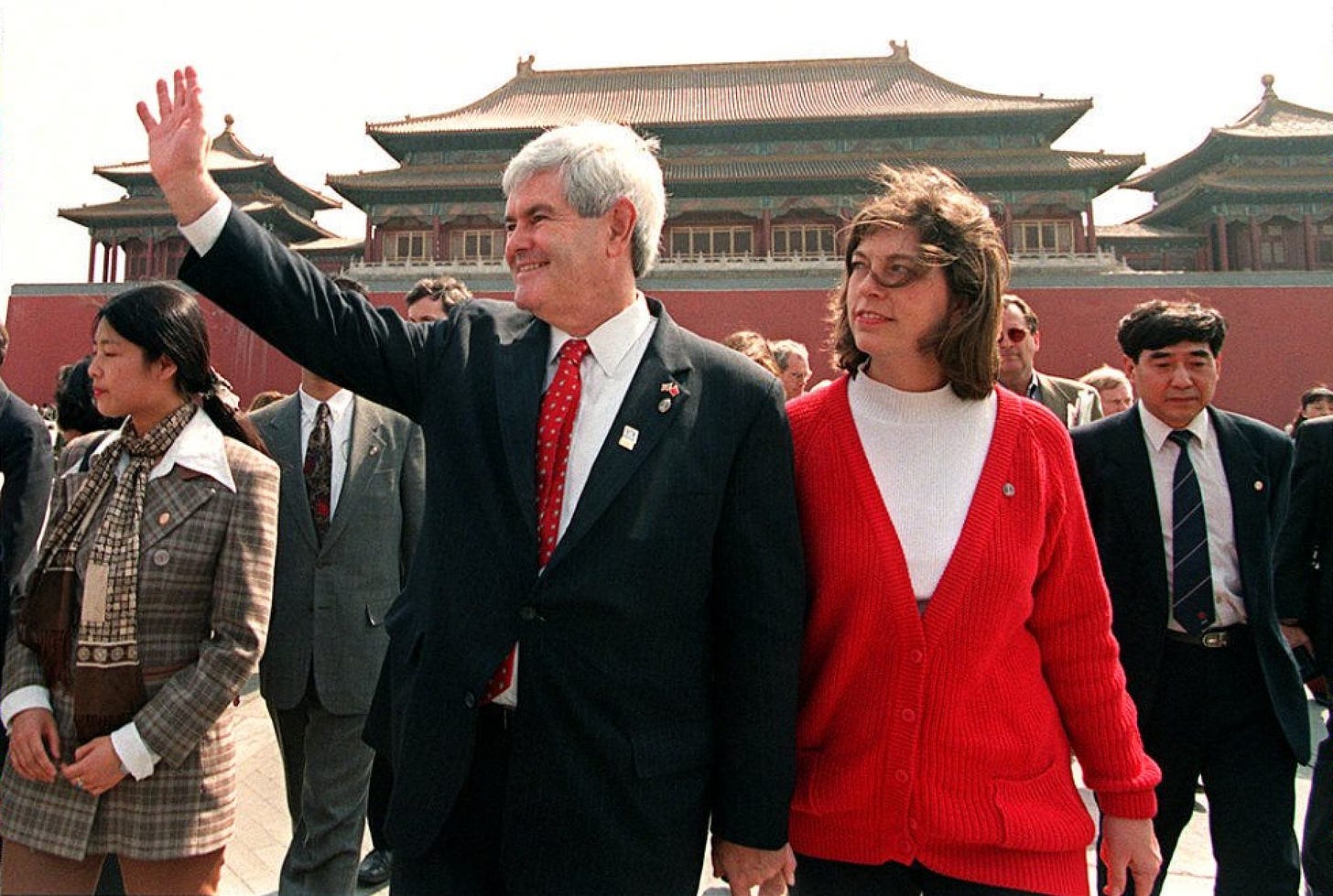 Then US House speaker Newt Gingrich waves as he tours the Forbidden City in Beijing with his wife Marianne on March 28, 1997. Gingrich followed in the footsteps of vice-president Al Gore, who visited Beijing earlier that week. Photo: AFP