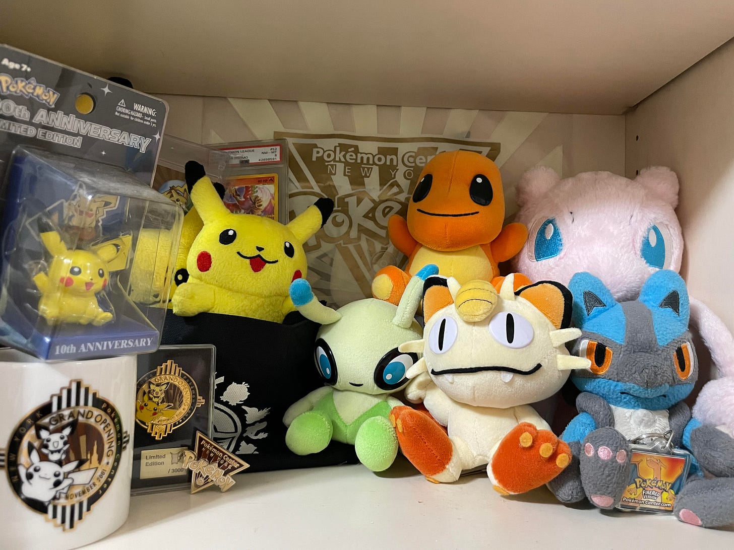 A selection of Julie's Pokémon plush toys and merchandise from the Pokémon Center New York