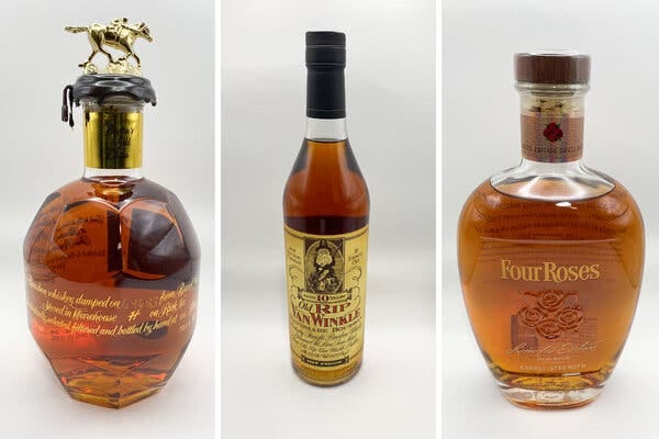 Three bottles of bourbon. One has a racehorse atop it, one says “Old Rip Van Winkle” and one says “Four Roses.”