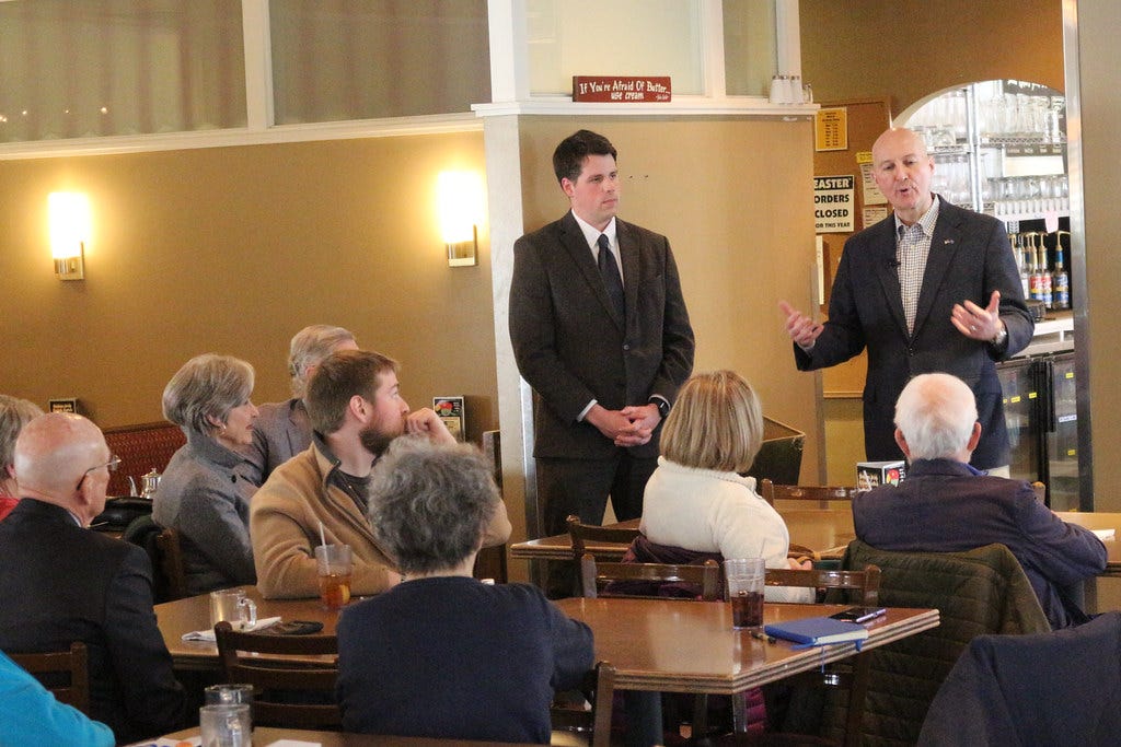 Ricketts talks Bidenomics, Border Security, and China over Pie at Omaha Town Hall