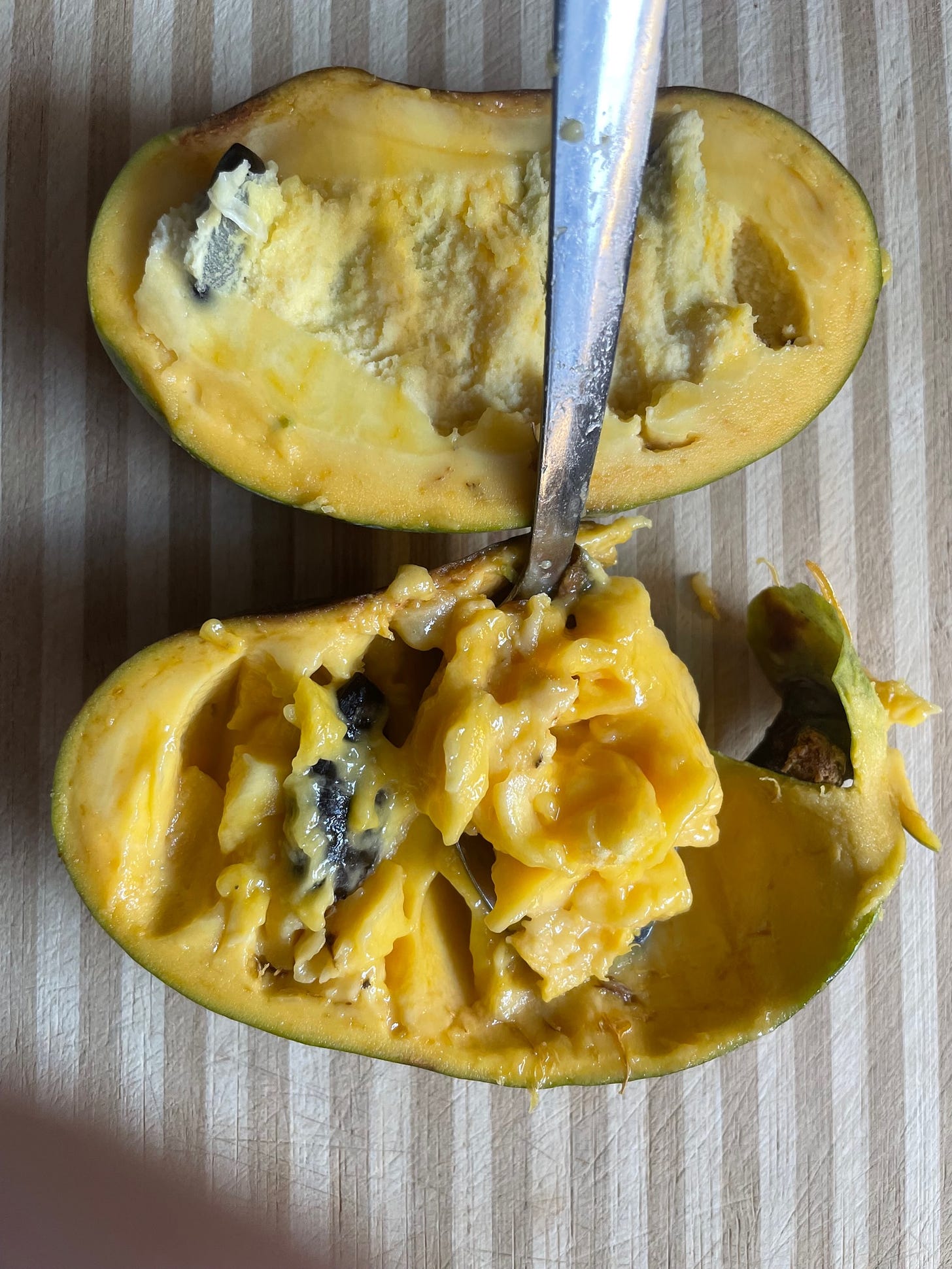 Pawpaw fruit sliced in half