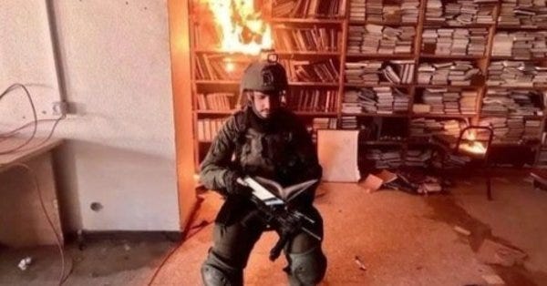 Israeli soldiers burn Al-Aqsa University library in Gaza Strip